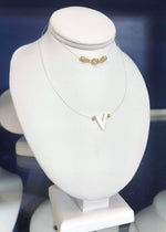 Invisible necklace with nacre letter char
