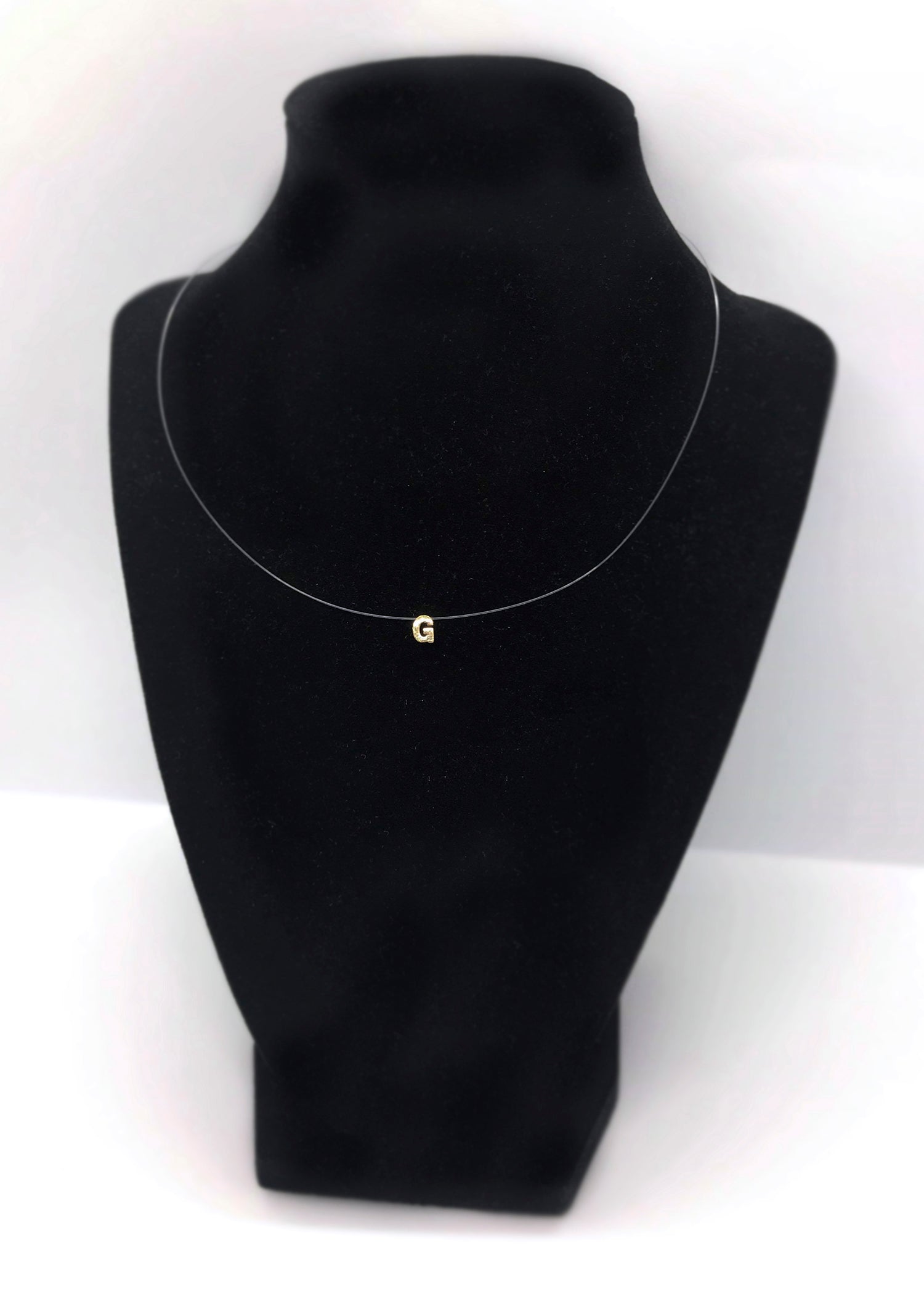 Invisible necklace with gold letter charm